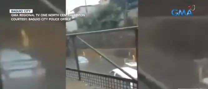 Vehicles parked in the floodway were submerged when heavy rains poured down in Baguio