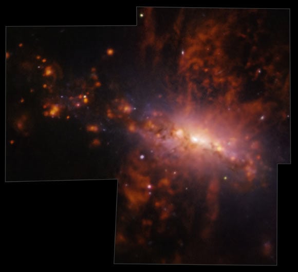 Astronomers Detect Enormous Bipolar Outflow from NGC 4383