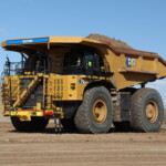 BHP and Rio Tinto collaborate on battery-electric haul truck trials in the Pilbara