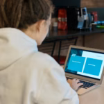 photo of woman using laptop