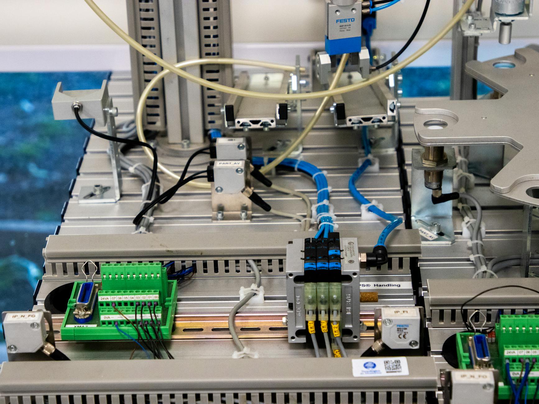 a machine with wires and electronics on it