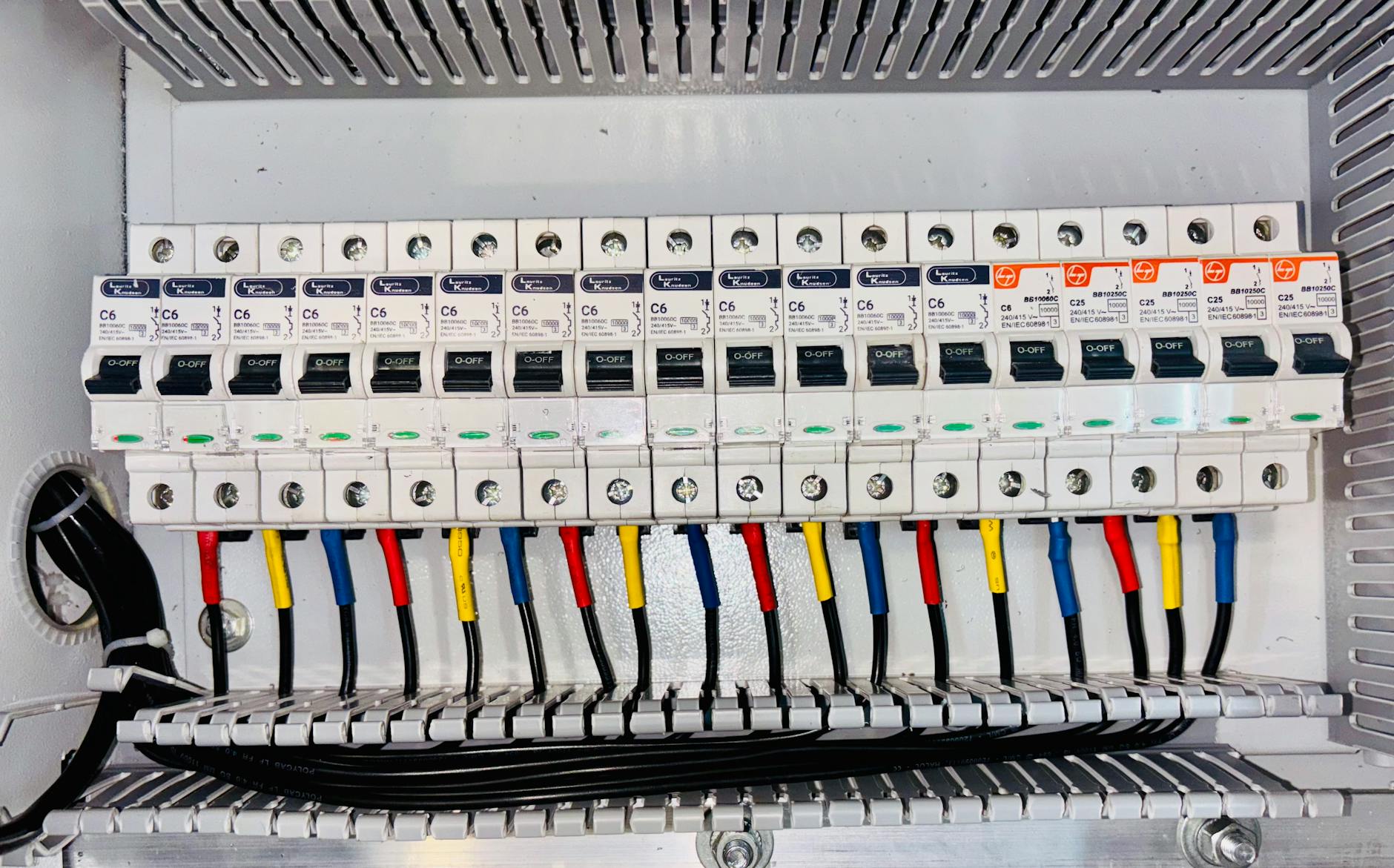electrical circuit breaker panel with color coded wiring
