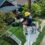 photography of man repairing electrical wires