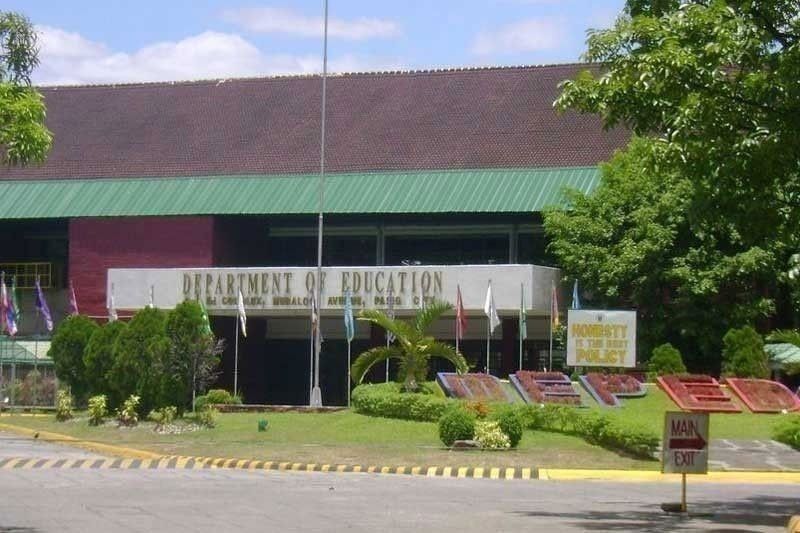 Teacher killed, students shot in a week of school violence
